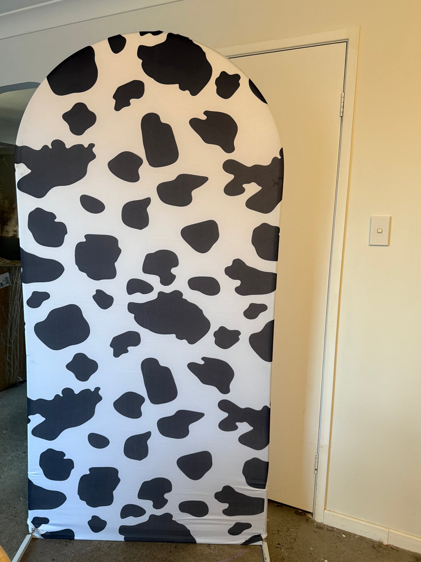 Cow print arch