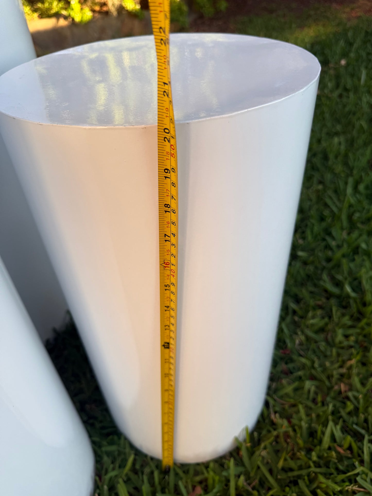 Cylinder white plinths