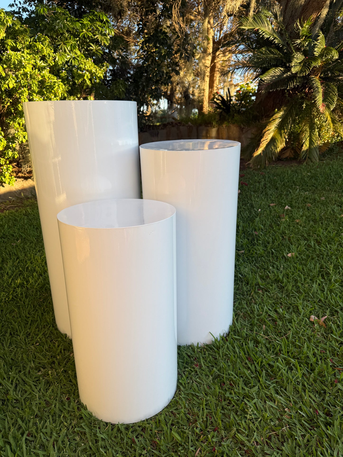 Cylinder white plinths
