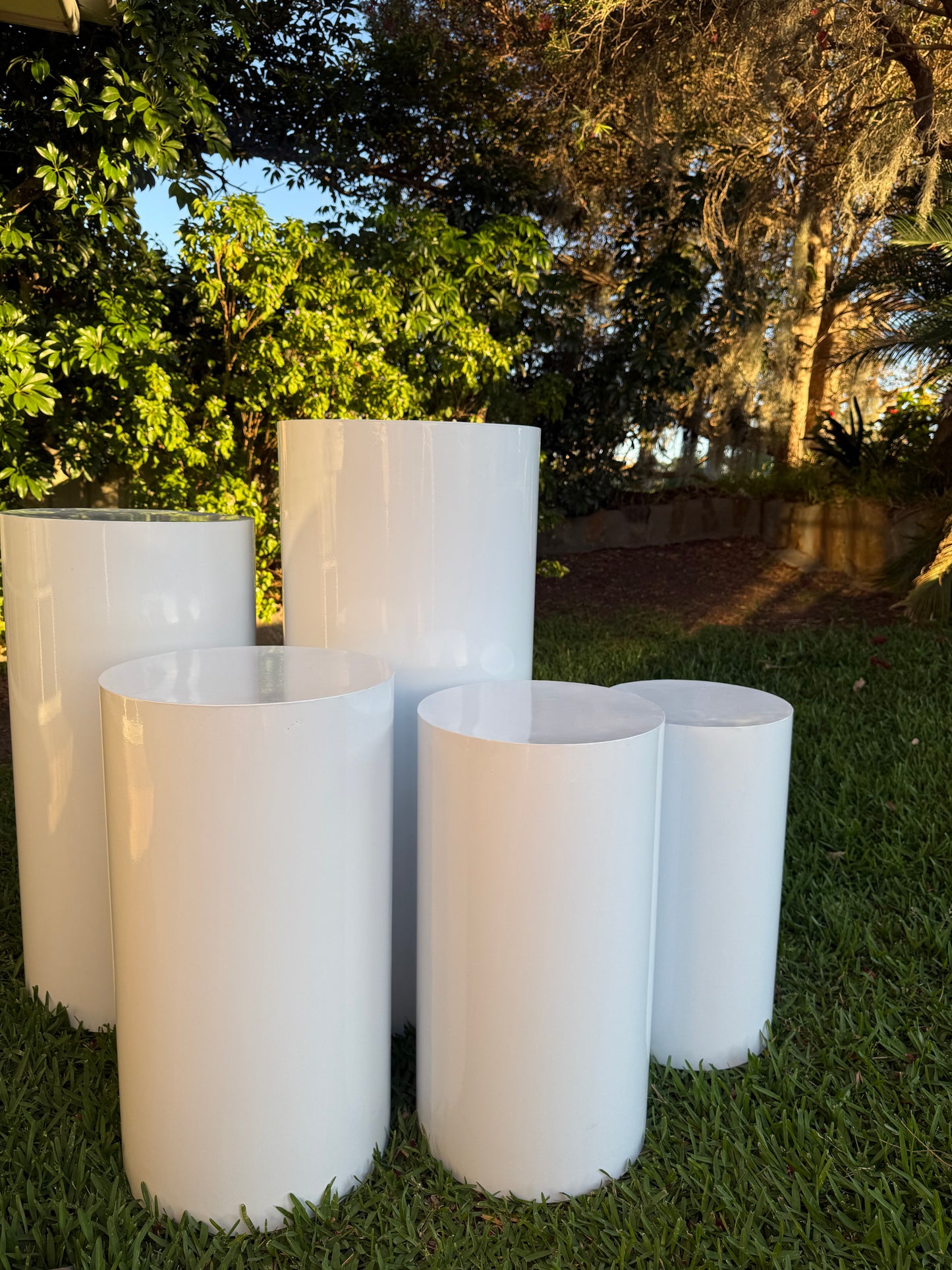 Cylinder white plinths