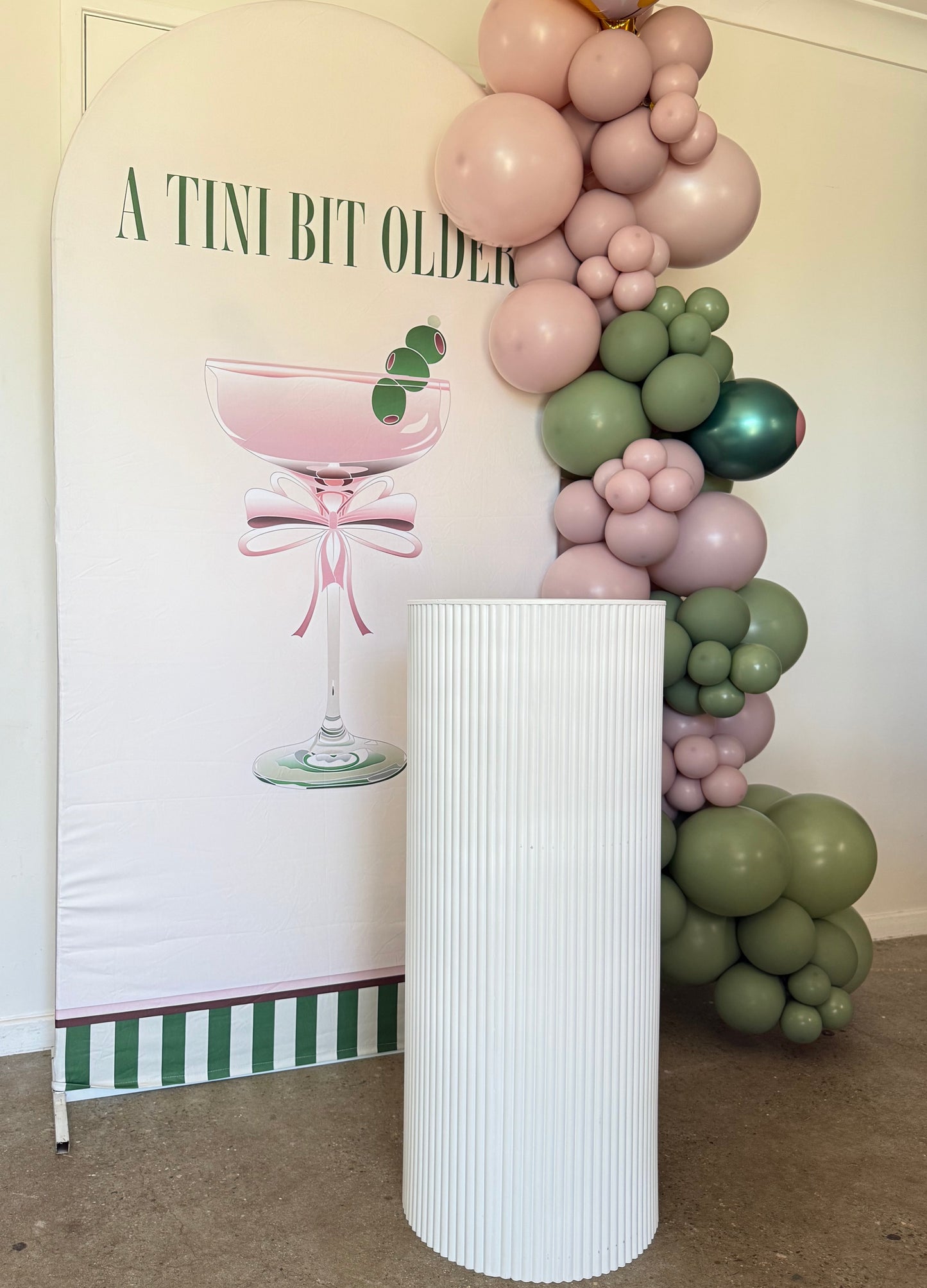 Tini bit older martini arch