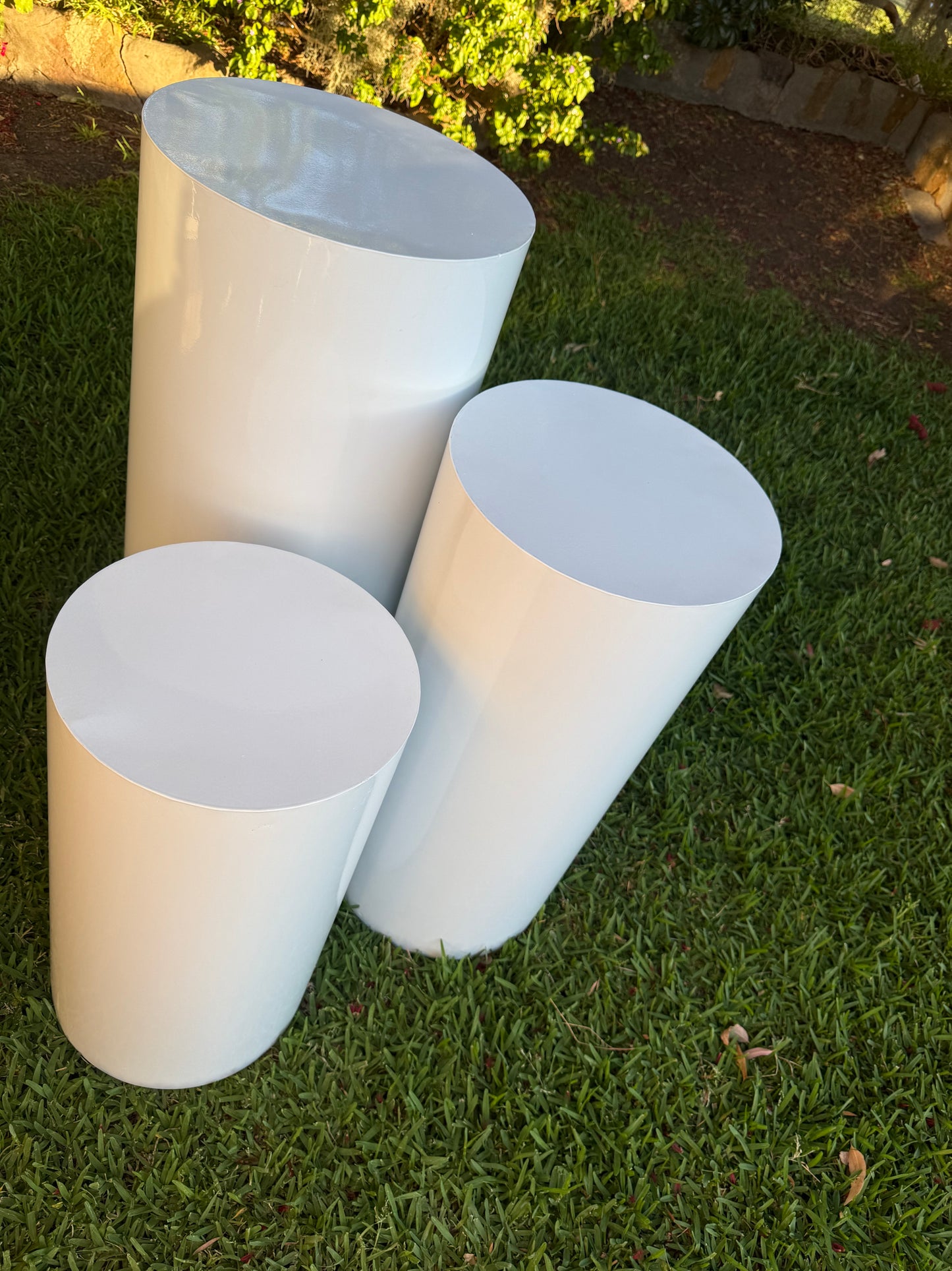 Cylinder white plinths