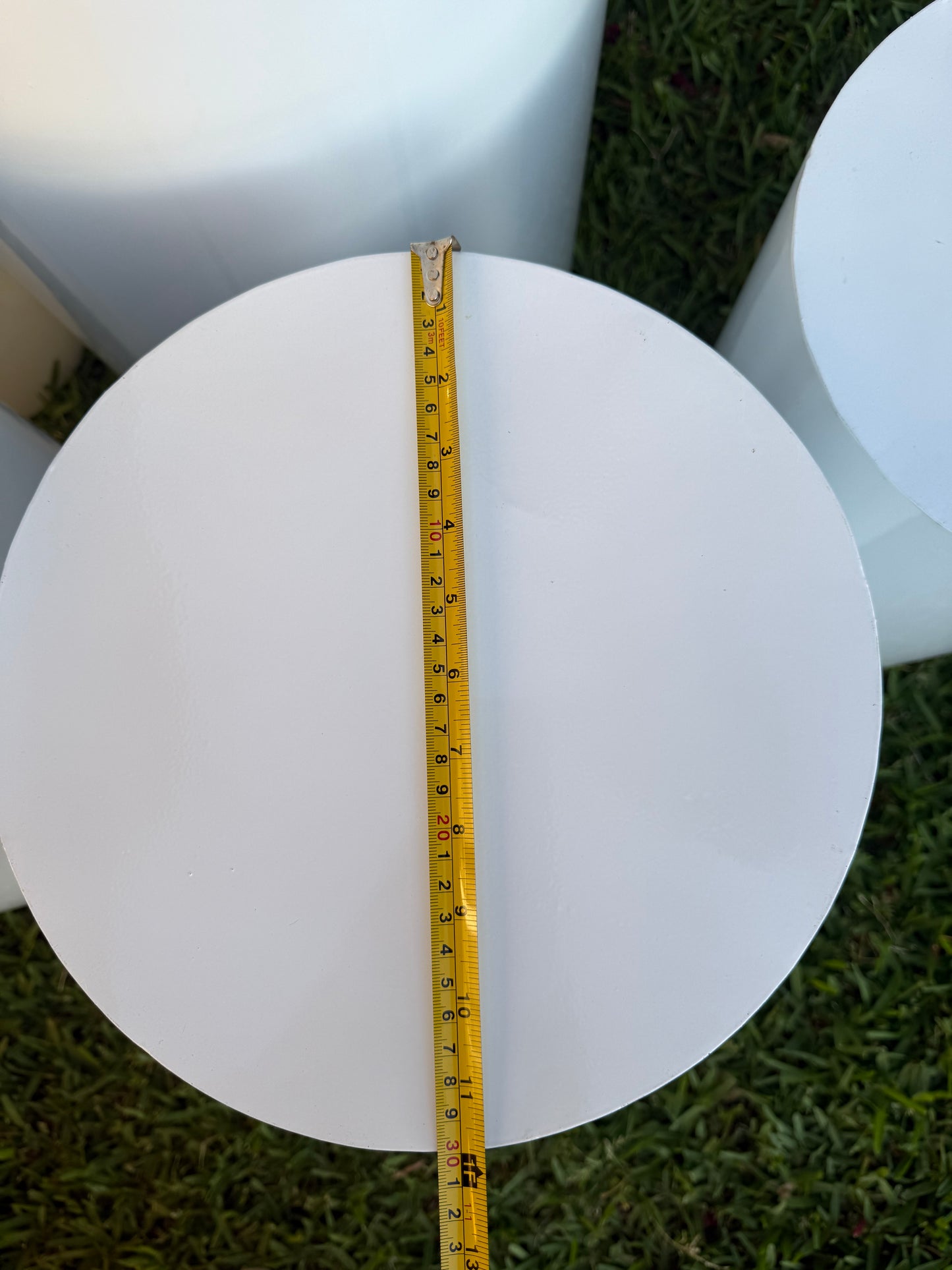 Cylinder white plinths