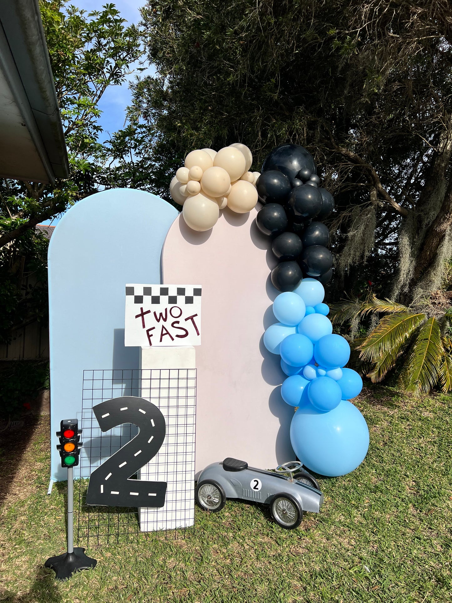 Car prop, tyres, black mesh, tyre cake stand and traffic light