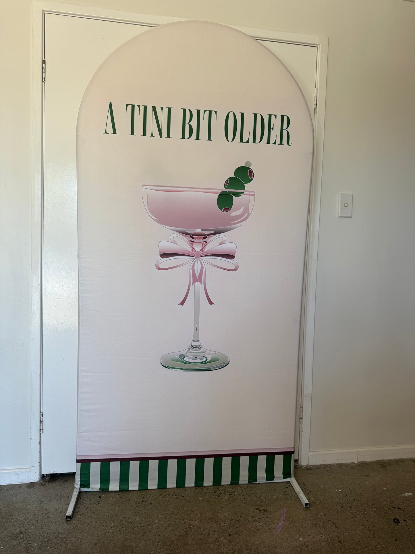 Tini bit older martini arch