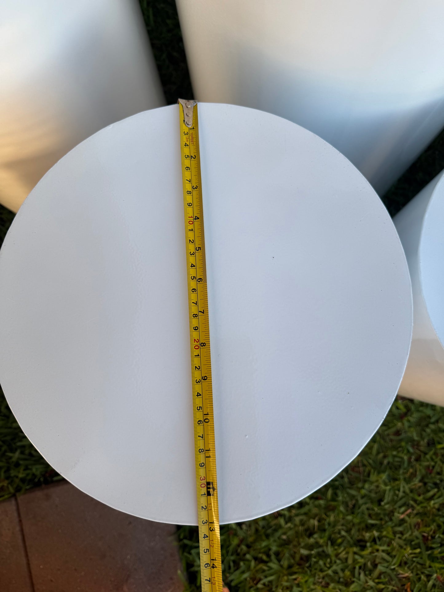 Cylinder white plinths