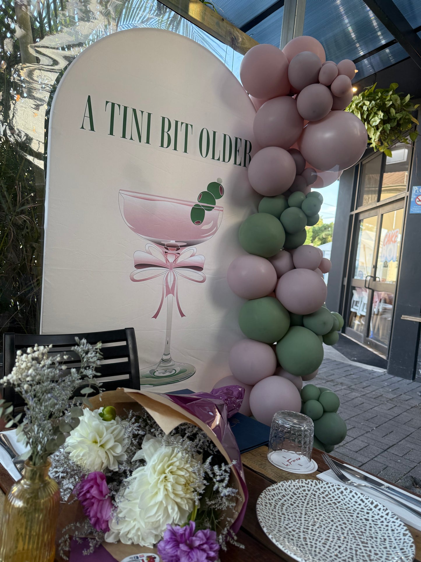 Tini bit older martini arch