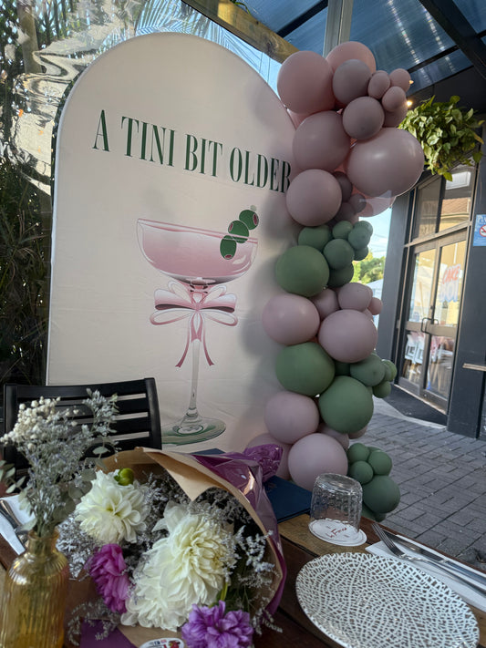 Tini bit older martini arch