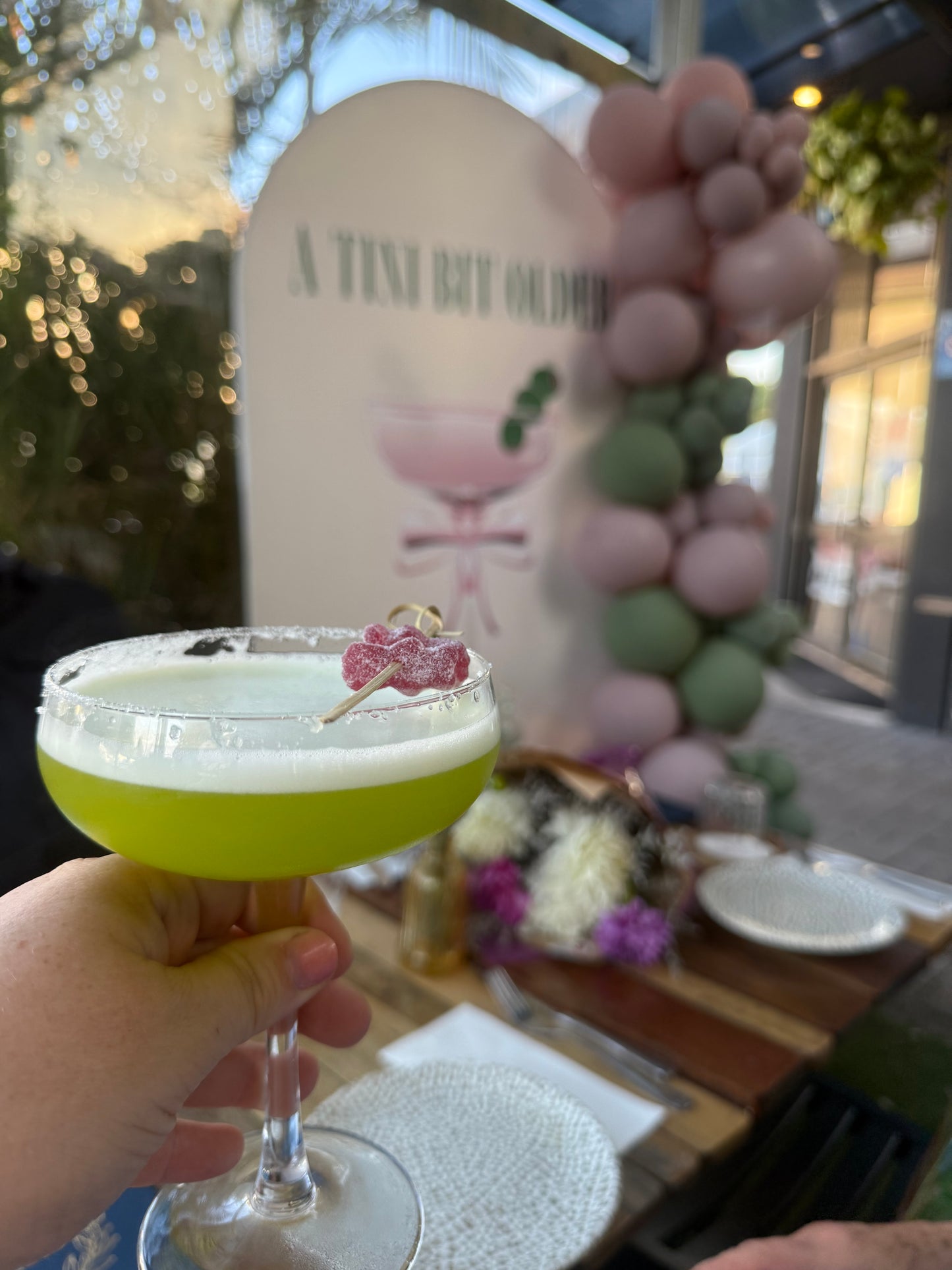 Tini bit older martini arch