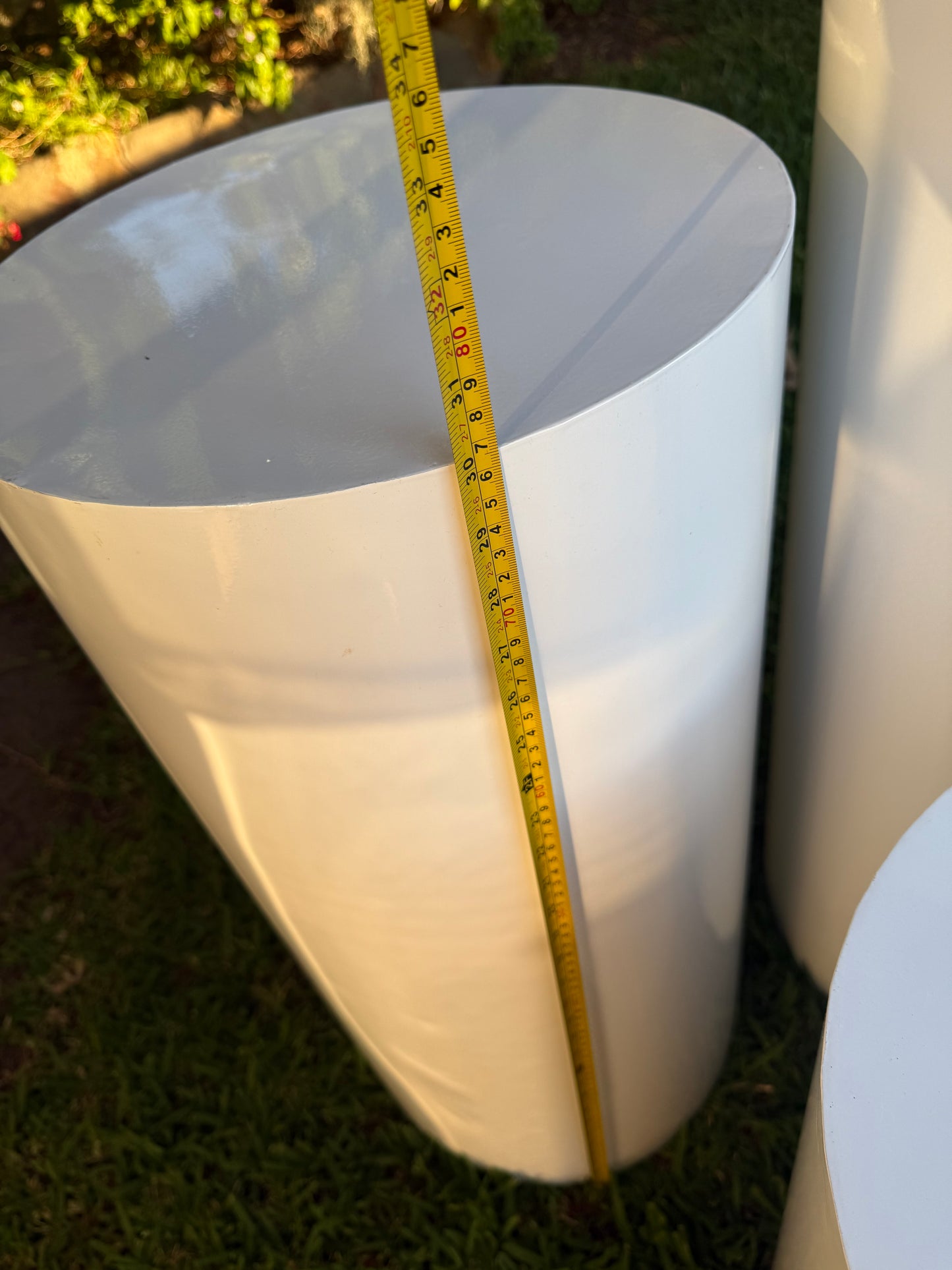 Cylinder white plinths