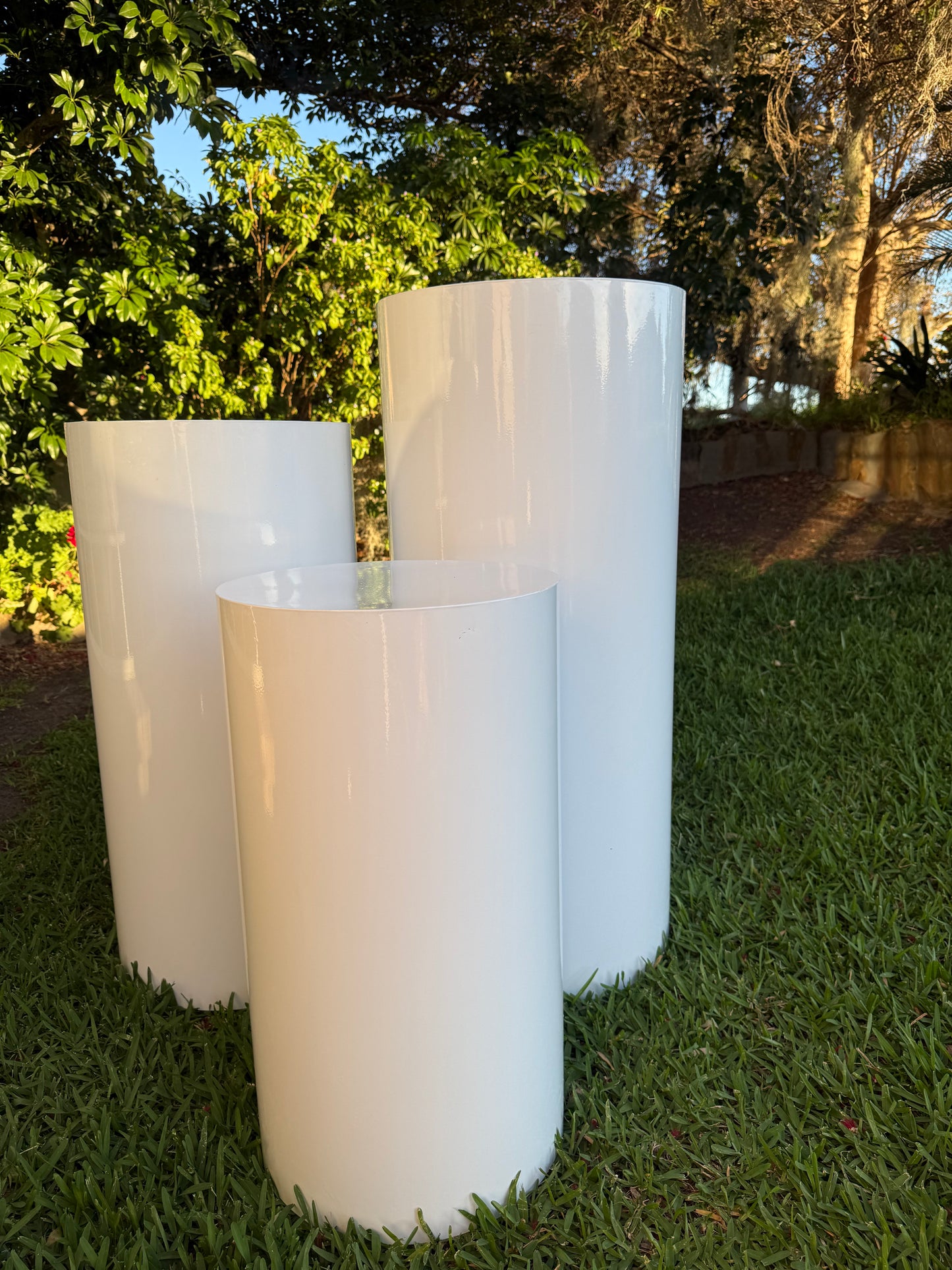 Cylinder white plinths