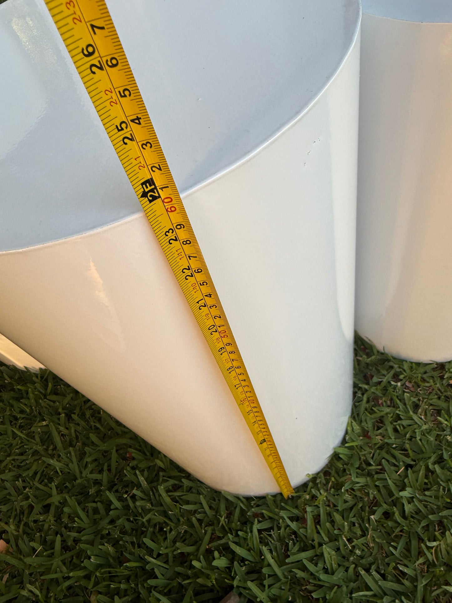 Cylinder white plinths