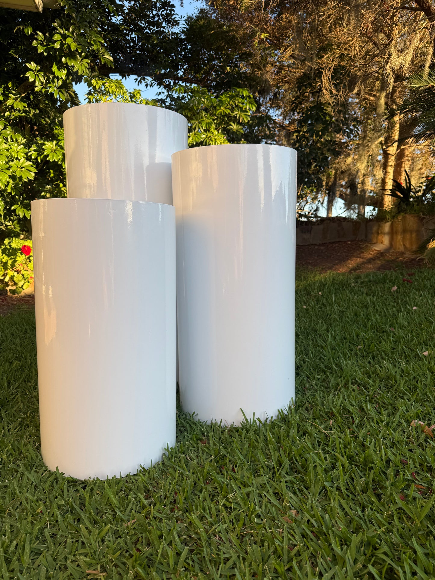 Cylinder white plinths